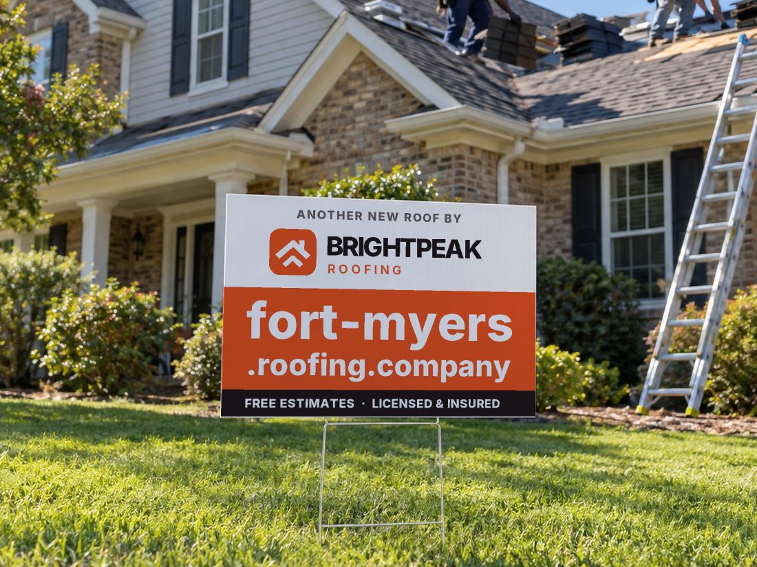 fort-myers.roofing.company on a yard sign in front of a house getting a new roof